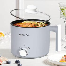 KERZION Electric Hot Pot 1.5L compact front view, ideal for dorm rooms and small kitchens.