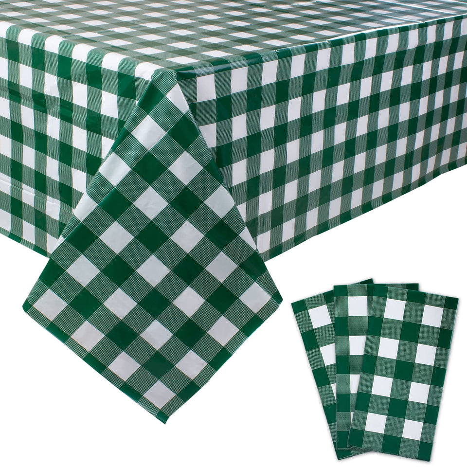 Kesfey 3-pack gingham tablecloths with 54x108 setup for outdoor picnic.