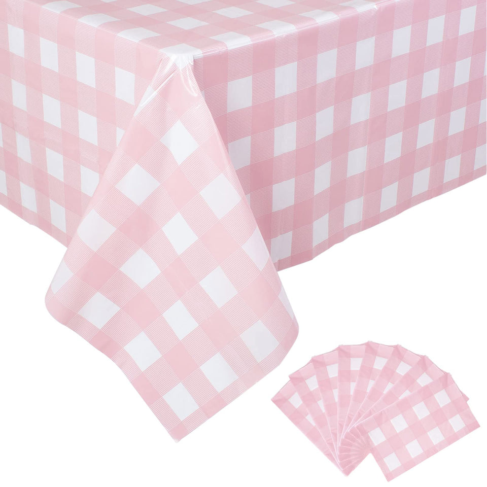 Kesfey pink and white checkered tablecover on full table for outdoor dining