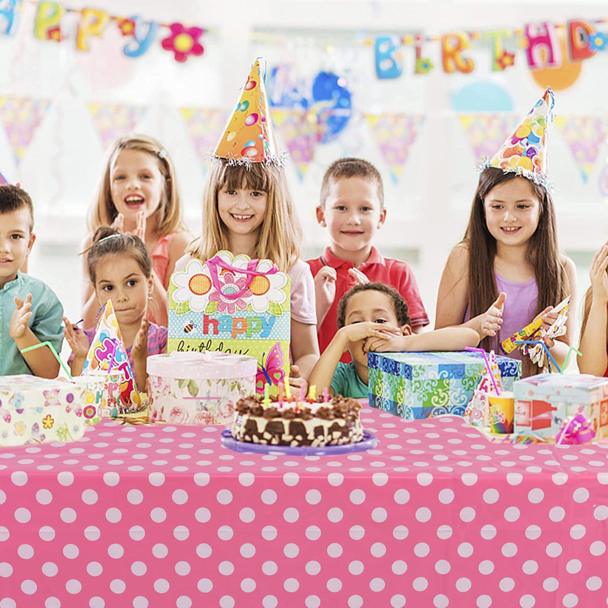 Kesfey polka-dot party tablecloth creates cohesive color themes.