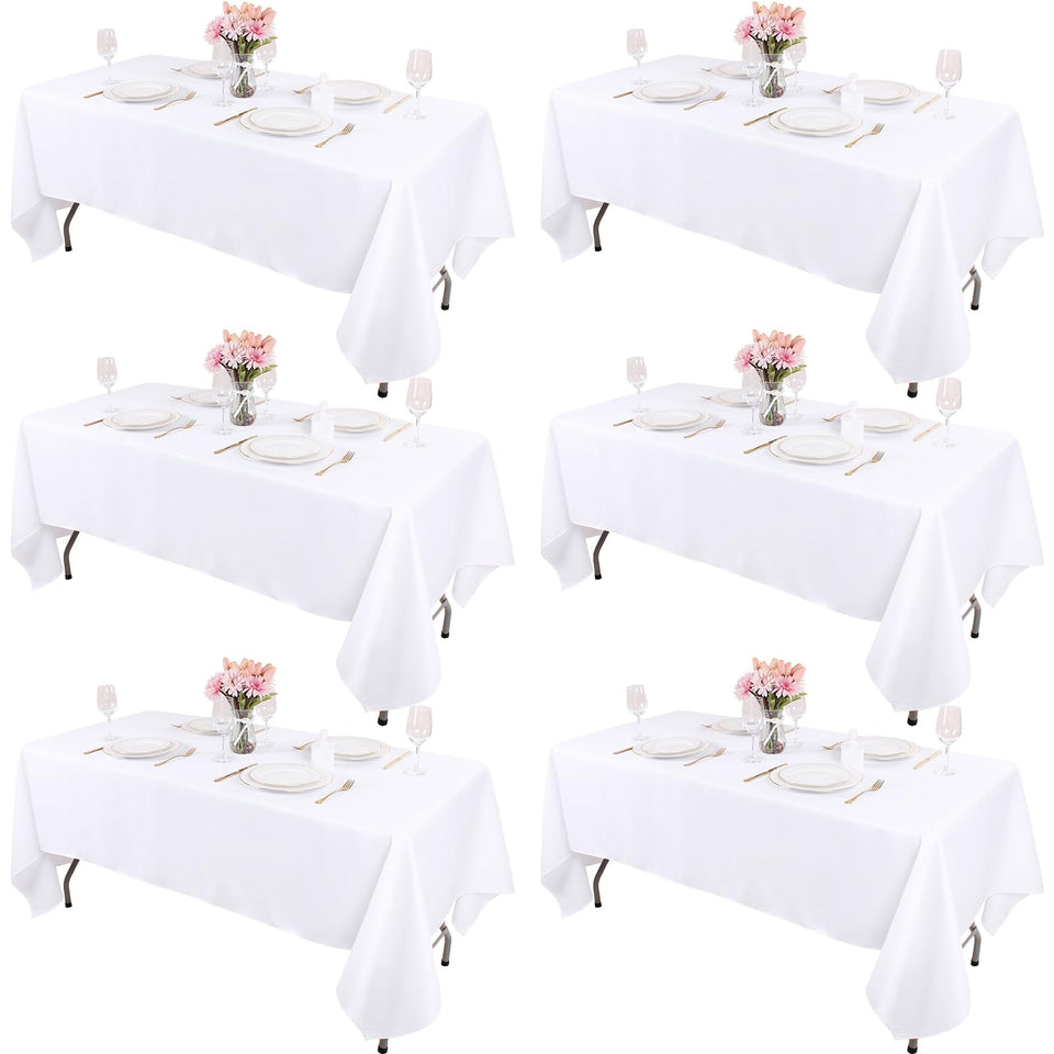 Kesfey white 70x120 tablecloth on table for elegant dining.
