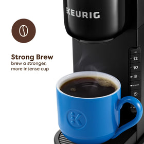 Keurig K-Express strong brew button close up for bolder flavor on demand
