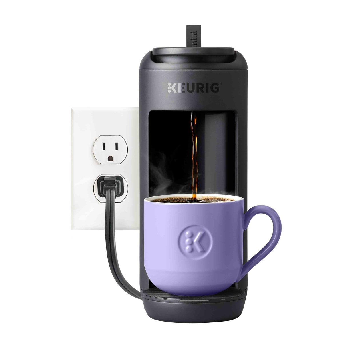 K-Mini Mate with a travel mug ready on a compact counter.