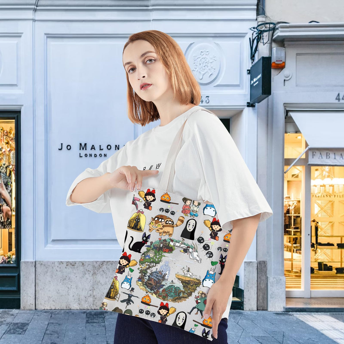 KEYCHIN No Face & Kiki tote bag back view showing durable canvas and waterproof coating.
