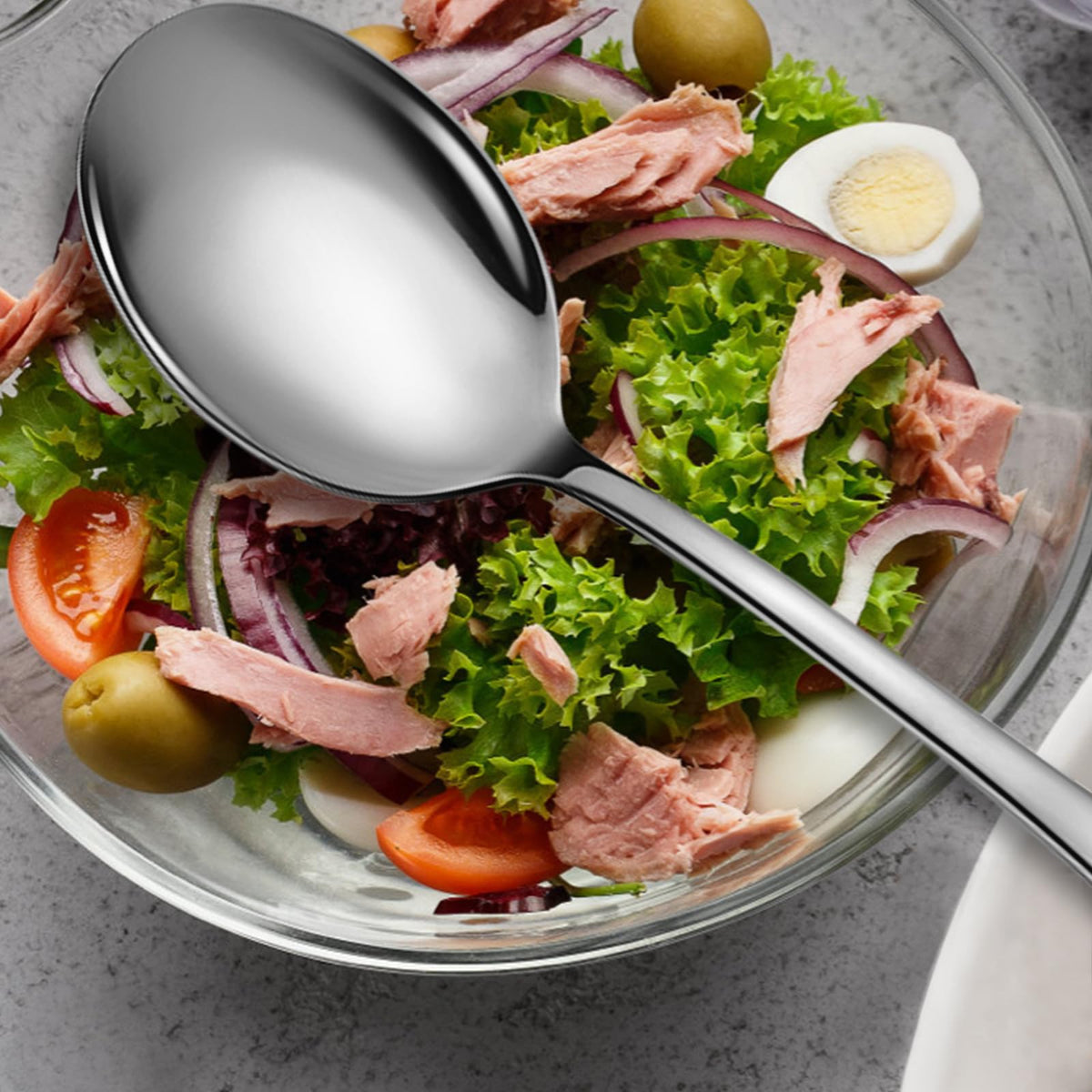 KeyOXY large 10-inch spoons ideal for scooping servings at catering events.