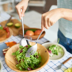 Keyoxy serving spoons with a mirror finish enhance table presentation.