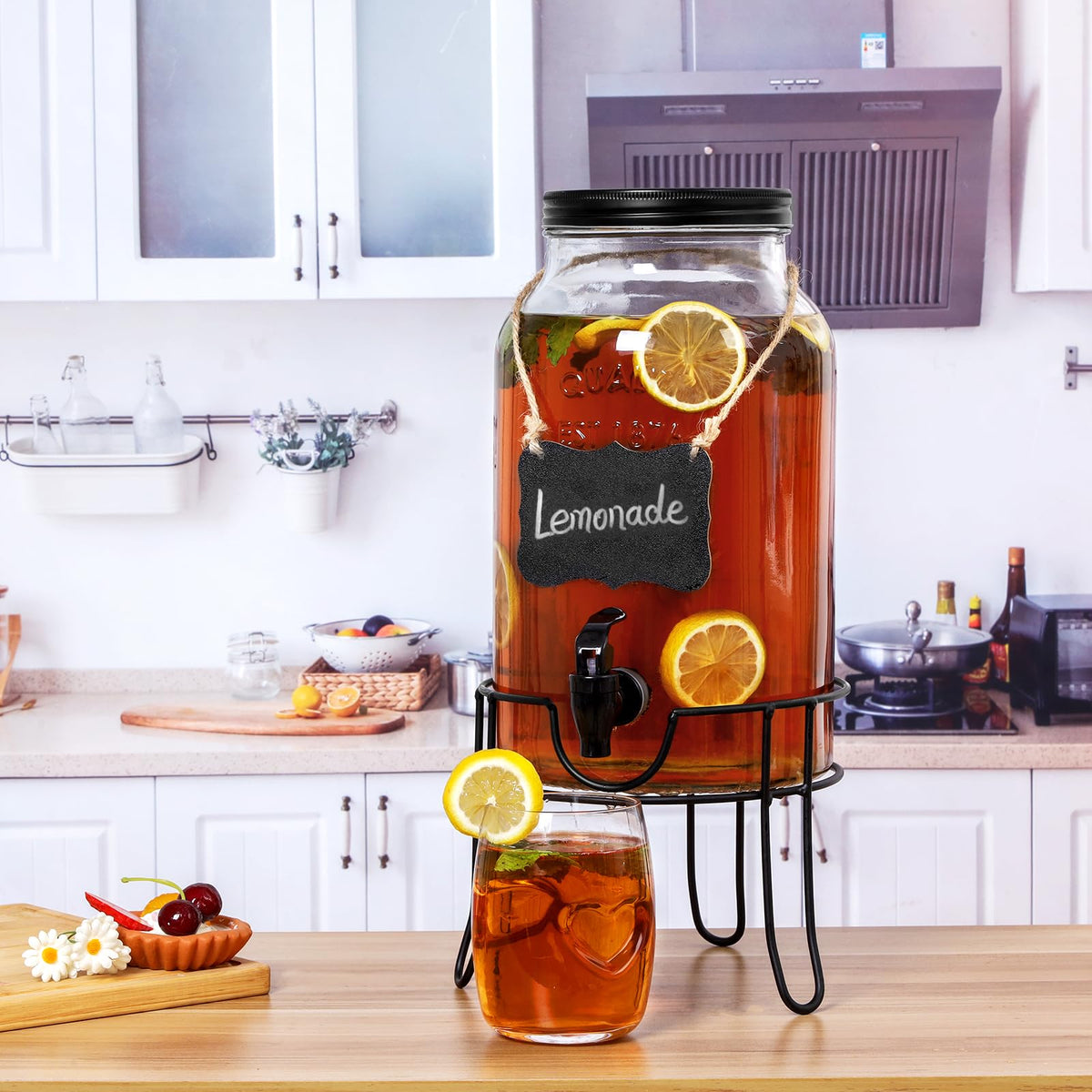 Khlotiko wide-mouth dispenser being filled quickly with ice and fruit.