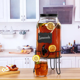 Khlotiko wide-mouth dispenser being filled quickly with ice and fruit.