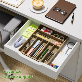 Kiasthome acacia wood drawer organizer in a kitchen drawer with seven slots