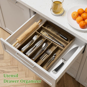 Kiasthome acacia wood drawer organizer displaying seven compartments for organized cutlery