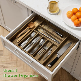 Kiasthome acacia wood flatware tray in a drawer with organized compartments.