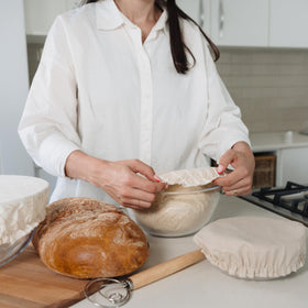 KIBAGA beige-patterned bowl cover adds a stylish kitchen touch.