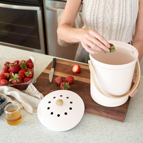 KIBAGA charcoal filter compartment reduces kitchen odors.