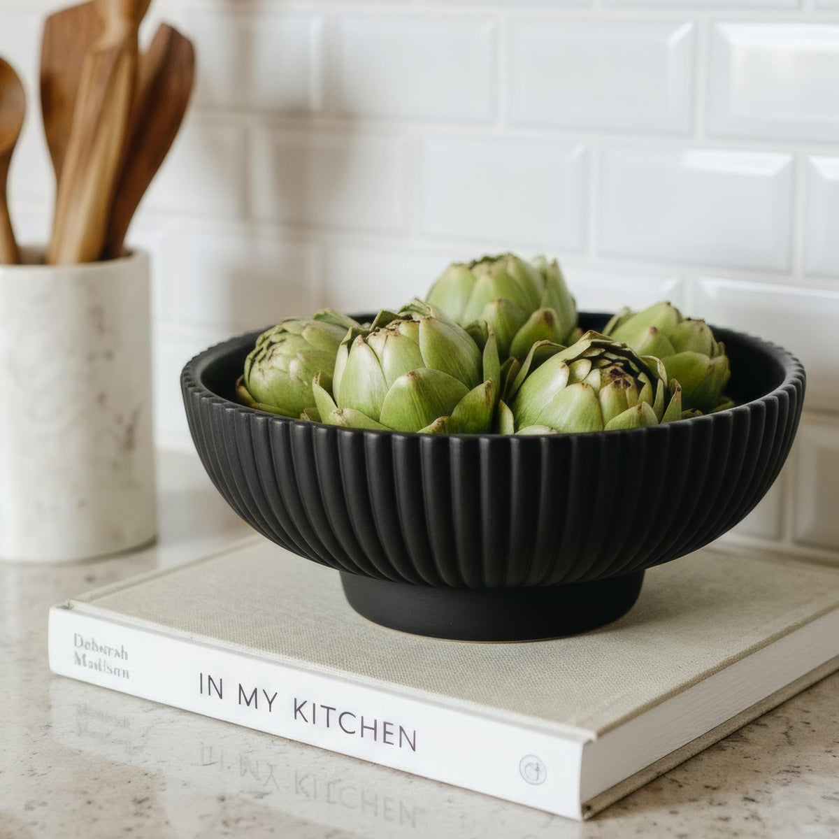 KIBAGA decorative concrete fruit bowl on counter shows modern centerpiece