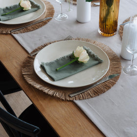 Fully set dining room with KIBAGA boho ensemble ready for guests