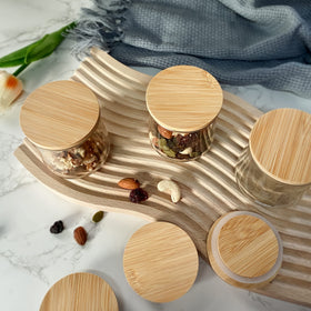 KIKINIKO Oui Yogurt Jar Lids are reusable and eco-friendly, reducing waste.