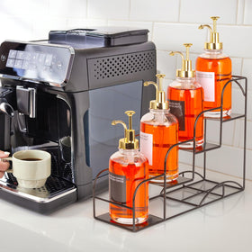 Kimilus iron bottle rack on the coffee bar organizes bottles neatly.
