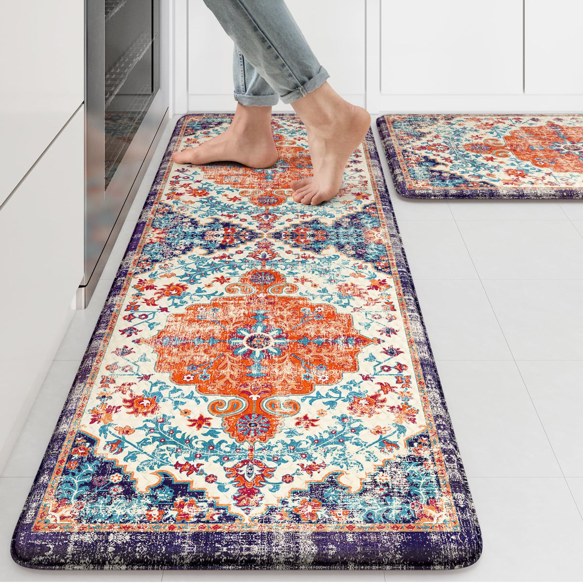 KIMODE anti-fatigue mat in orange 17x47 cushions feet during long cooking sessions.