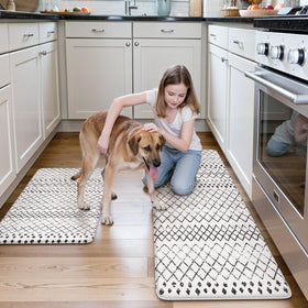 KIMODE black and white boho kitchen rug elevates decor and comfort.