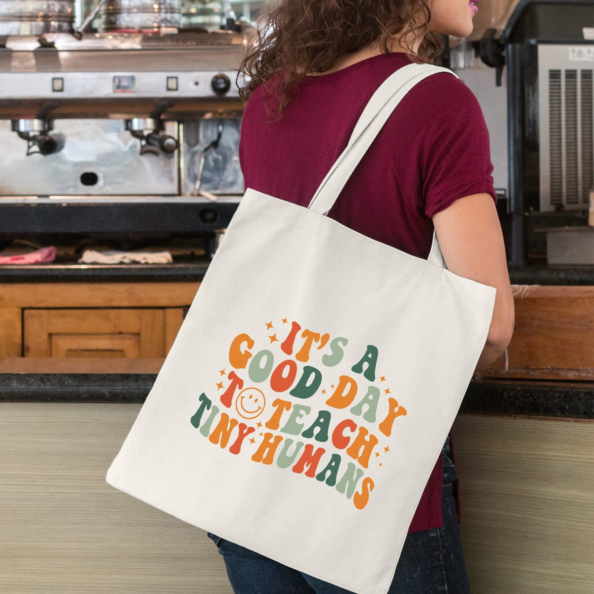 Kimoli canvas tote bag beach scene showing versatility for travel and leisure.