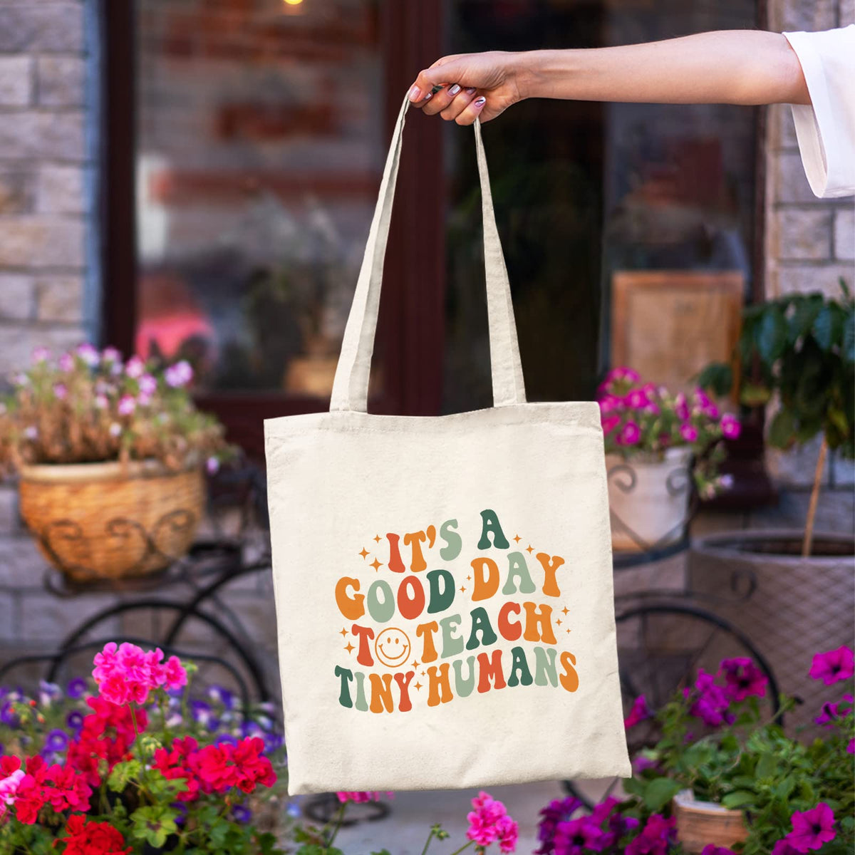 Kimoli reusable tote with long strap close-up for comfortable shoulder carrying.