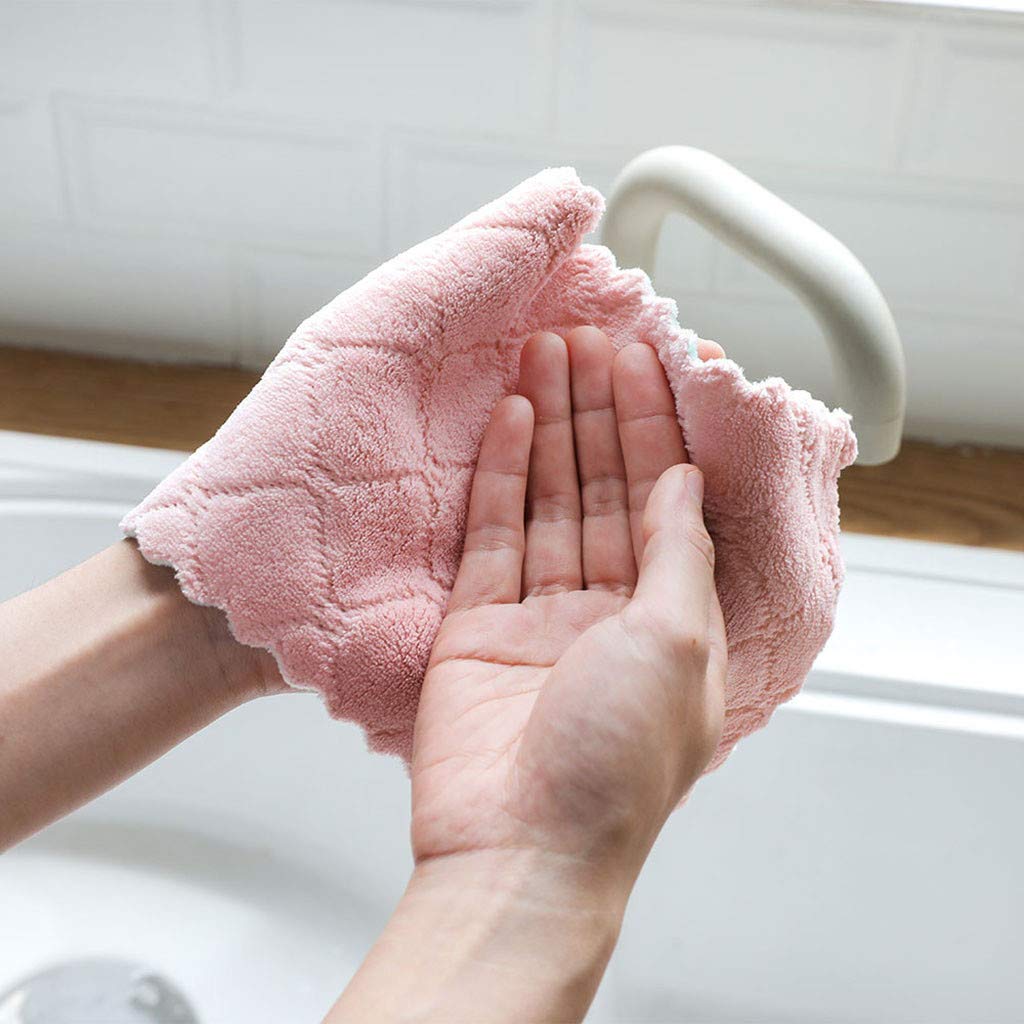 Kimteny coral velvet towels in pink-grey provide gentle cleaning for surfaces.