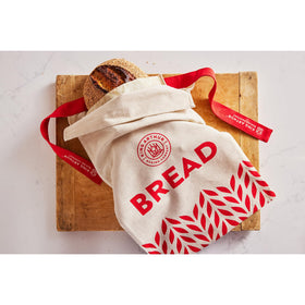 Breathable King Arthur design supports crust and crumb without plastic wrap
