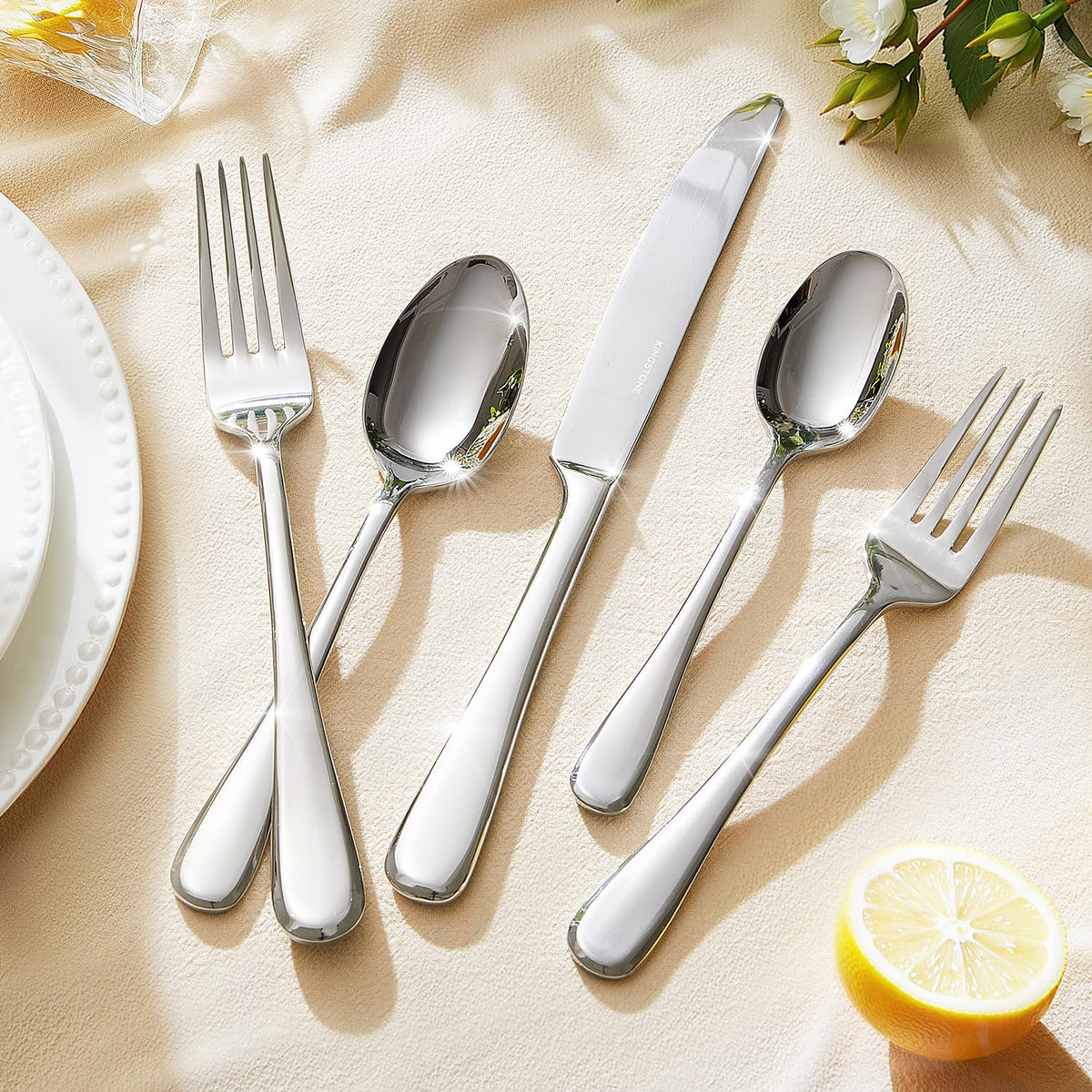 Kingstone silverware with ergonomic handles offers comfortable grip during meals.