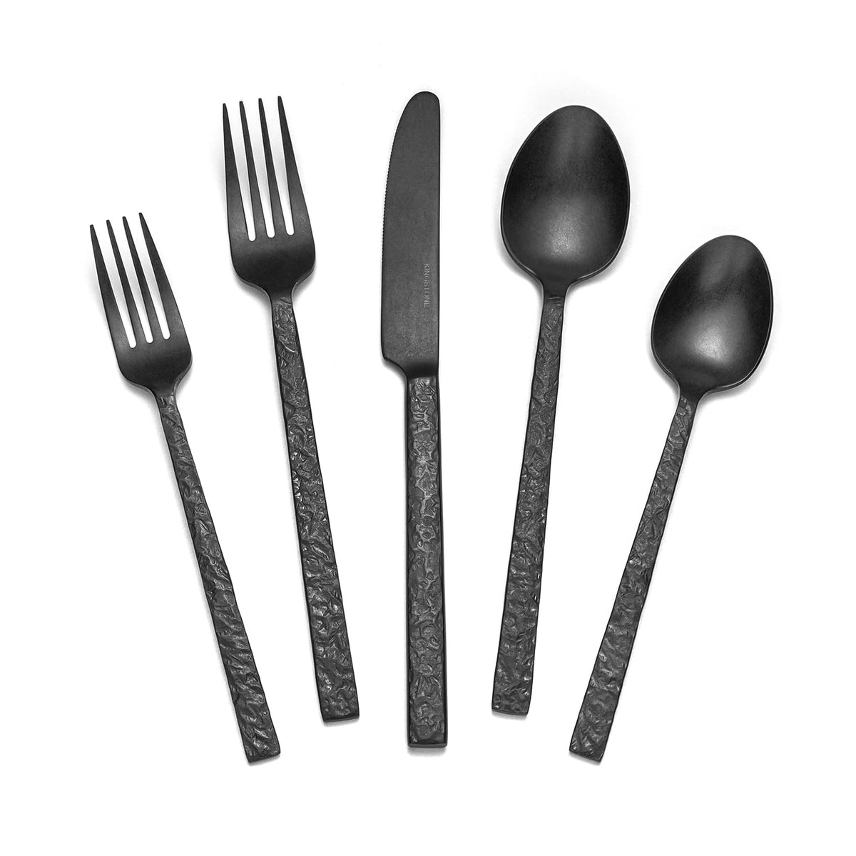 Kingstone 60 piece black hammered silverware on a dining table for family meals