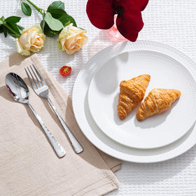 65-piece set covers service for 12 with coordinating serving pieces.