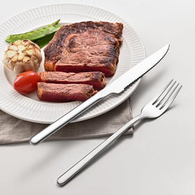 Table setting featuring KINGSTONE knives paired with 66 series silverware.