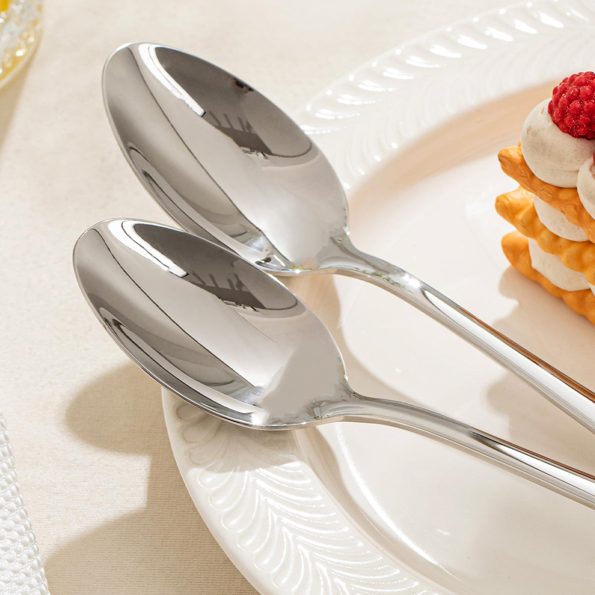 KINGSTONE dinner spoon highlighting a polished edge for safe, comfortable use.