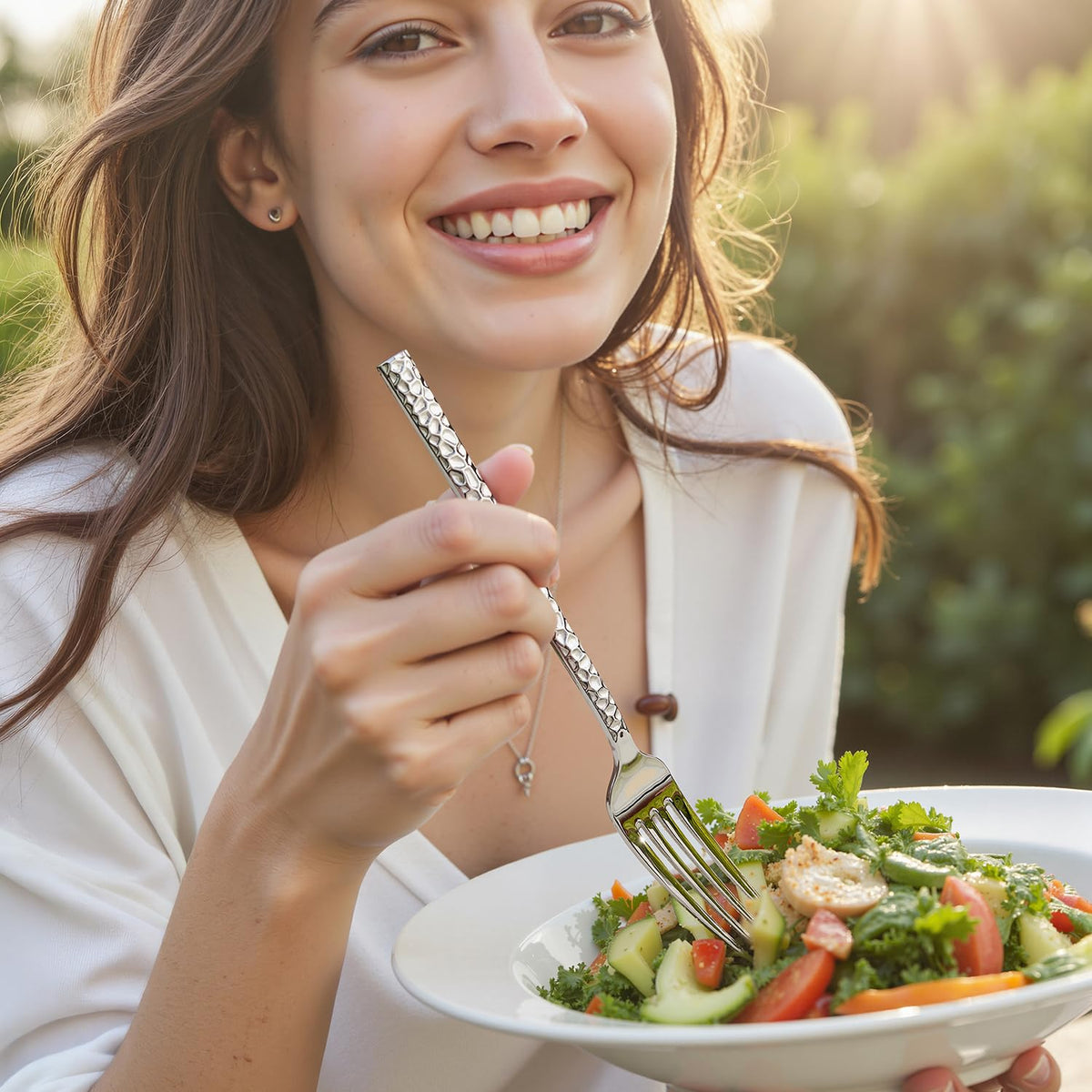 Kingstone hammered silverware closeup handles highlight comfortable trapezoid grip.