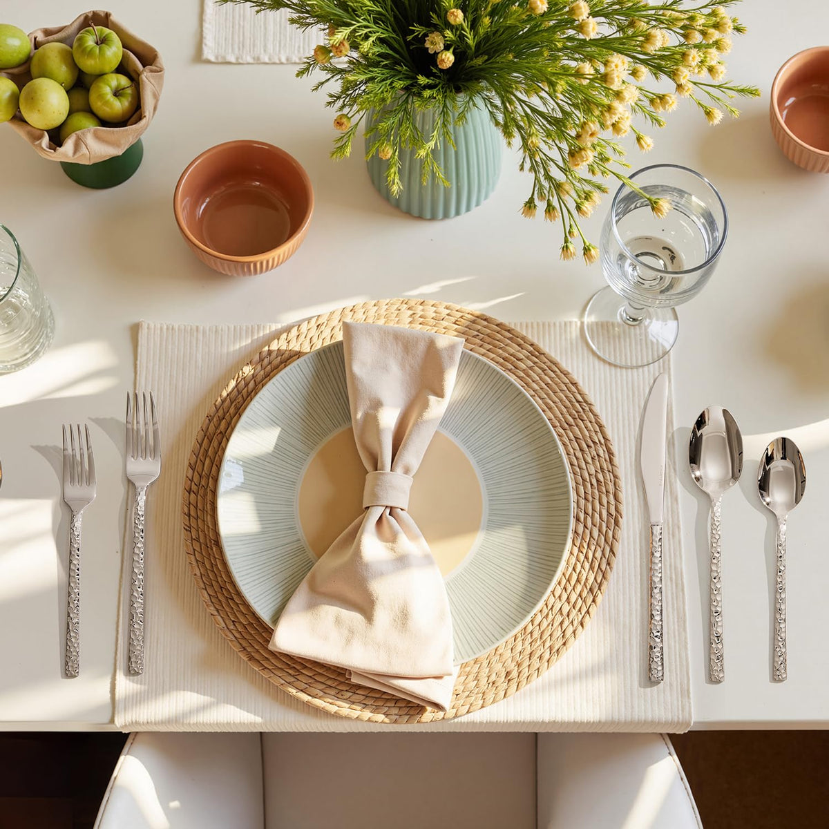 Kingstone hammered silverware table setting showcases elegant decor for upscale dining.