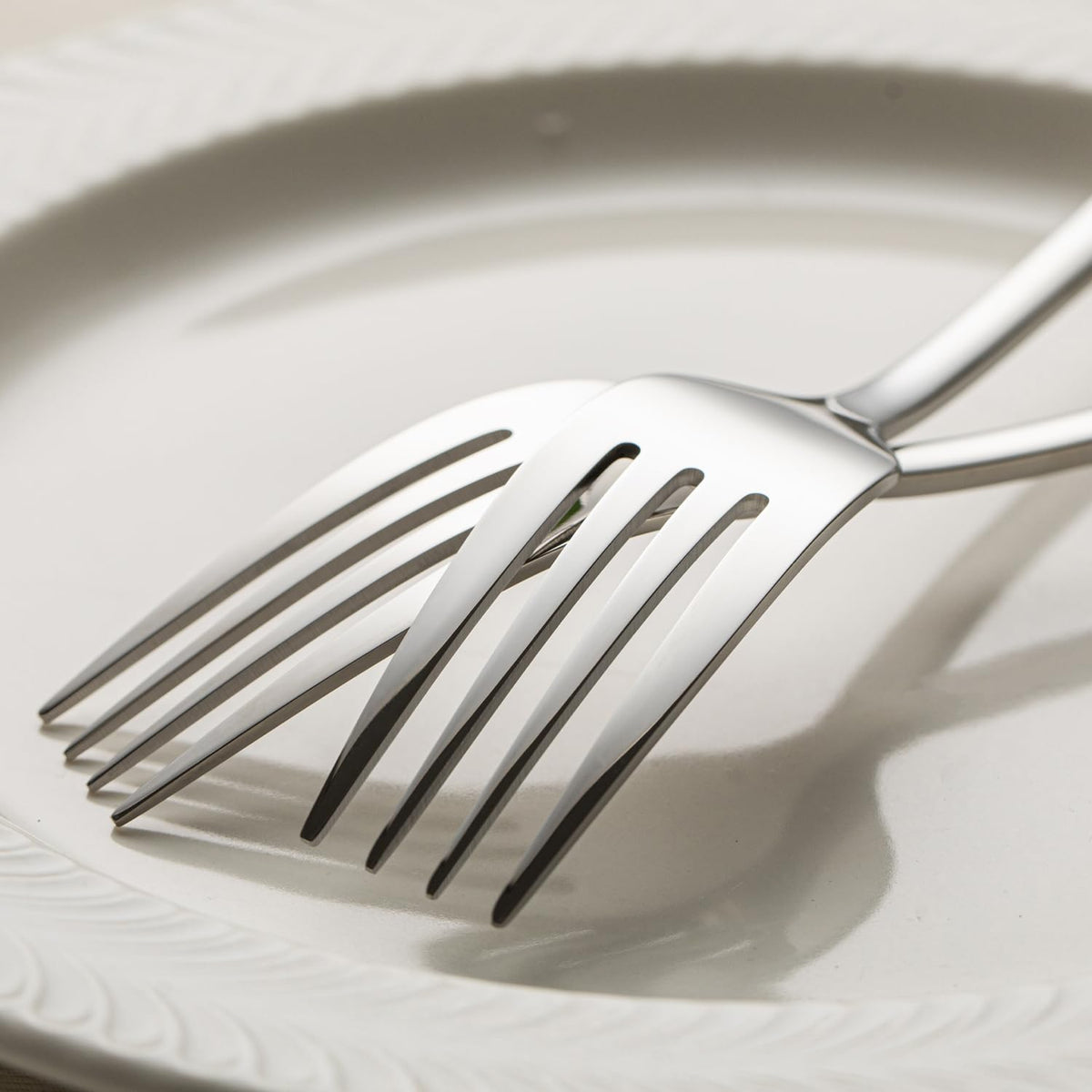 Kingstone forks feature a mirror finish that elevates table settings.
