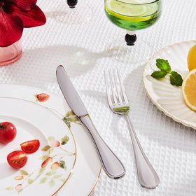 Kingstone mirror-polished finish enhances table appeal.