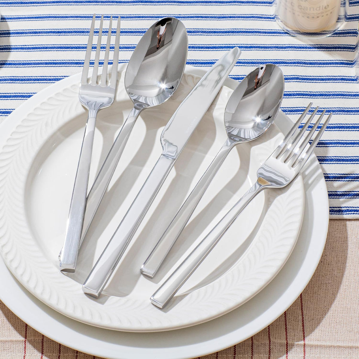 KINGSTONE service for eight arranged on a formal place setting, perfect for weddings or dinners.