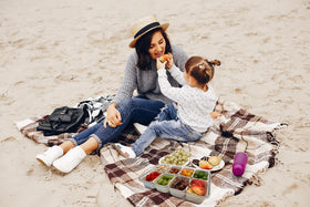 KINNSTO Snackle Box modular compartments for snacks, fruits, and veggies.
