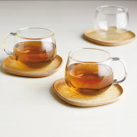 Kinto Unitea cup highlights visible tea color in a clear glass