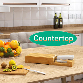 Elegant bamboo knife block complements kitchen decor while protecting blade edges.