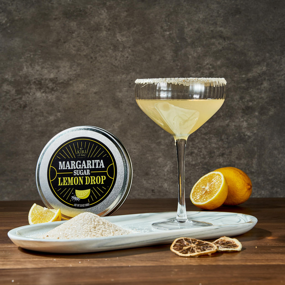 Kiri & Sons rimmer on bar setup with ready-to-rim cocktails