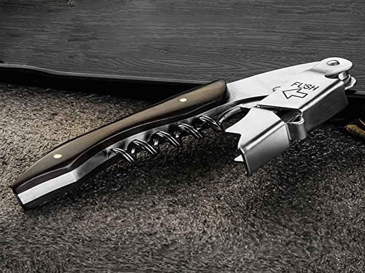 Kit-Home wine key with rosewood handle opens corks smoothly for service.