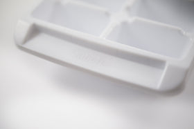 Kitch stackable ice trays neatly fit in the freezer.