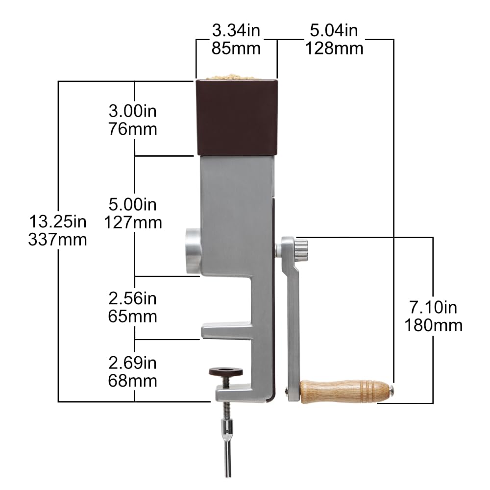 Kitchen Crop grain mill grinding wheat into flour on a clean counter.