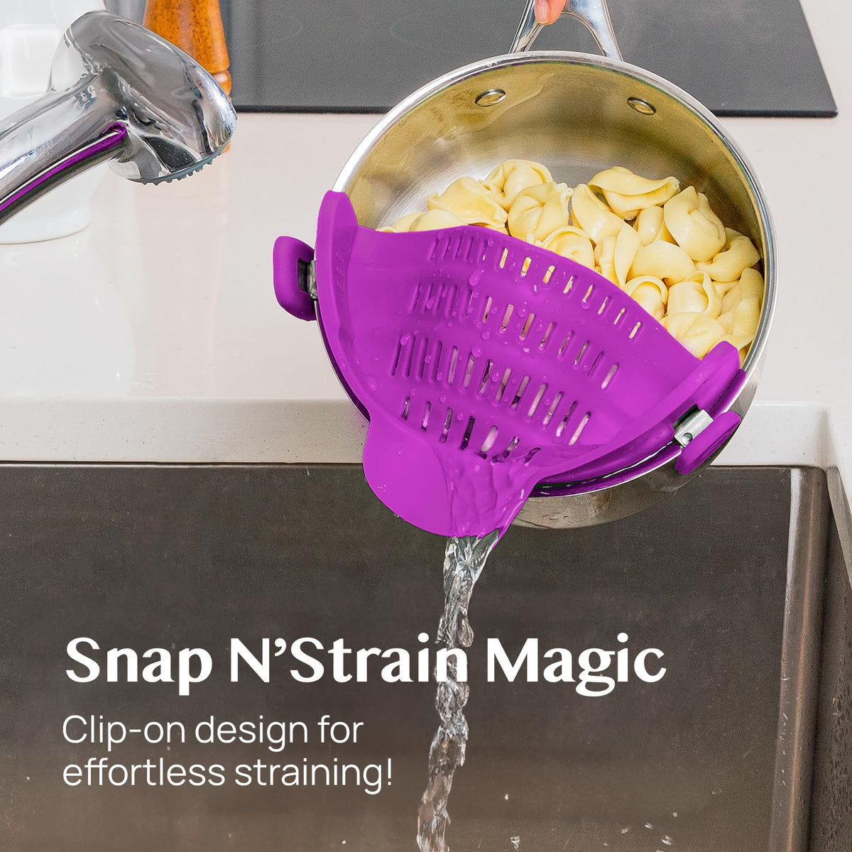Kitchen Gizmo Snap N Strain clipping onto a pot for hands-free pasta draining
