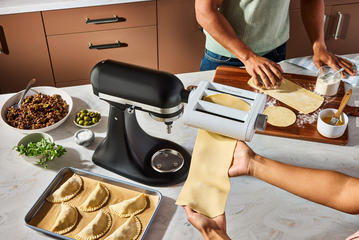 KitchenAid 3-in-1 pasta attachment removable top cover for easy cleaning.