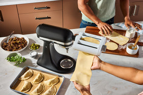 KitchenAid 3-in-1 pasta attachment removable top cover for easy cleaning.