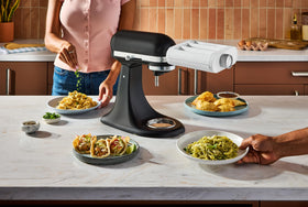 KitchenAid 3-in-1 pasta attachment spaghetti-cut option for fresh noodles.
