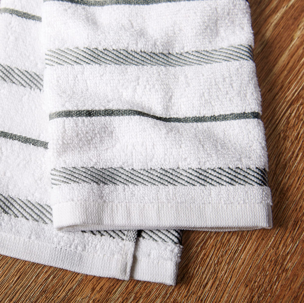 KitchenAid Albany towels shown drying glassware for a streak-free finish