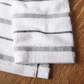 KitchenAid Albany towels shown drying glassware for a streak-free finish